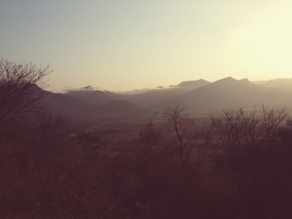 Sunset over the Gomukhi Dam reservoir