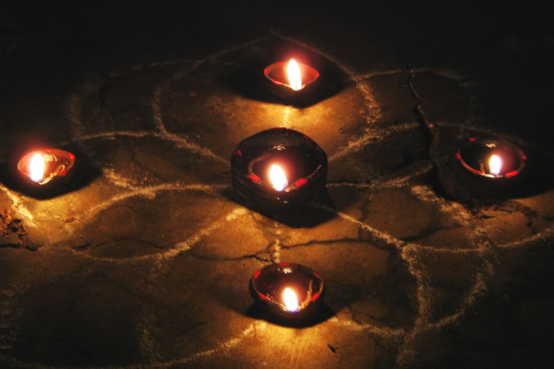 The Karthigai Deepam beacon glowing atop the Annamalai hill during the festival.